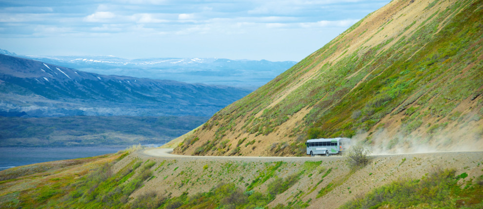 Tour bus in the distance on the Denali Park Road. Tour bus in the distance on the Denali Park Road.