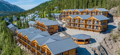 Stay at a cozy lodge like the Denali Bluffs Hotels.