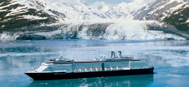 Holland America Oosterdam cruising in front of a glacier in Alaska.