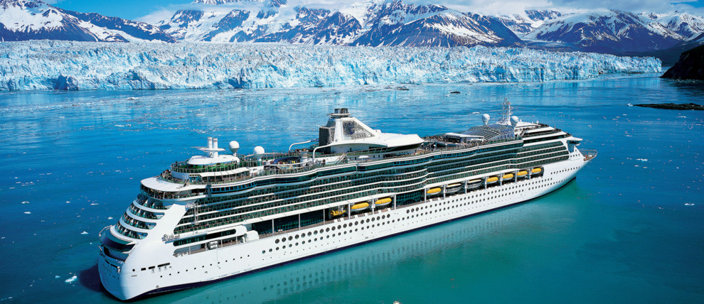 Royal Caribbean Cruises Serenade of the Seas cruising in front of a glacier in Alaska.