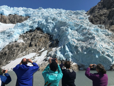 Guests taking pictures of the Northwestern Glacier.