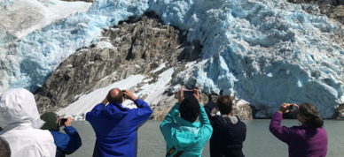 Guests taking pictures of the Northwestern Glacier.