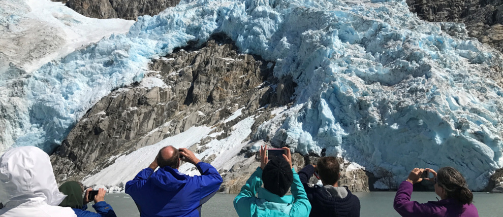 Guests taking pictures of the Northwestern Glacier.