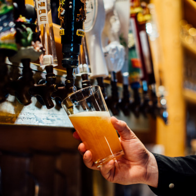 Purchase a beverage at the Seward Windsong bar.