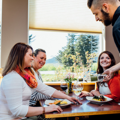 Enjoy a meal at the restaurant at Seward Windsong Lodge.