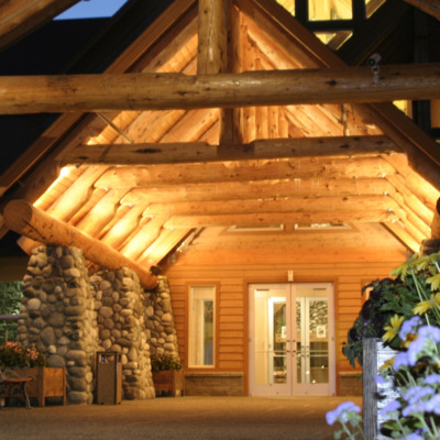 Talkeetna Alaska Lodge portico at night. 