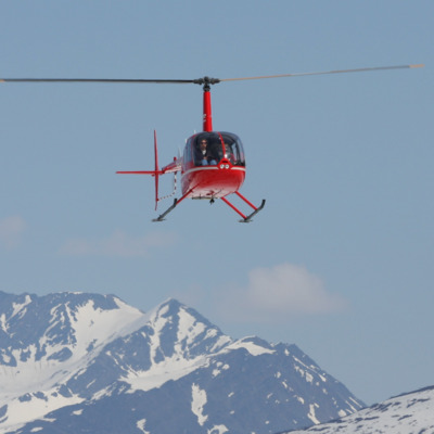 Travel by helicopter to Punch Bowl Glacier.