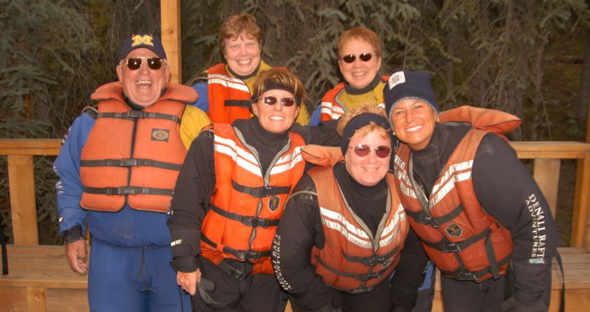 Happy group of rafters posing for a photo.