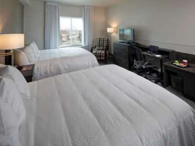 Totem Hotel and Suites offers double queen rooms and king bed rooms.