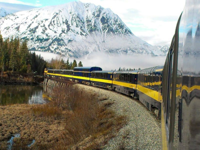 Alaska Railroad train crosses Trail River Bridge on its way to Seward.