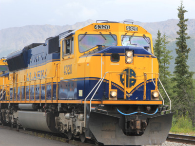 Vibrant Alaska Railroad in route to Denali National Park.