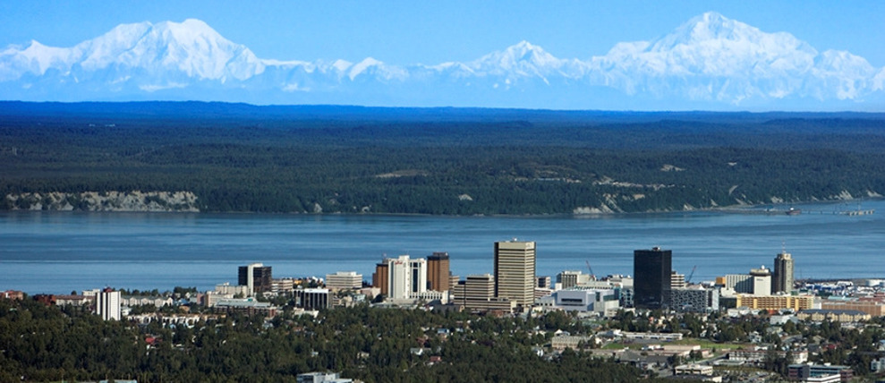 Photo overlooking Anchorage with the Chugach mountains in the backdrop. Photo overlooking Anchorage with the Chugach mountains in the backdrop.