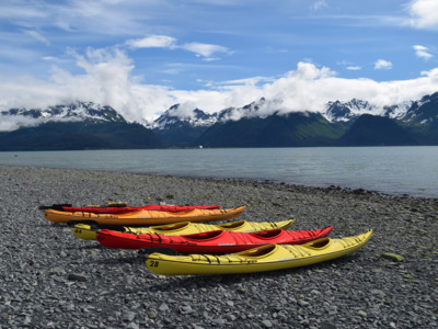 Colorful kayaks in Resurrection Bay outside of Seward Alaska. Colorful kayaks in Resurrection Bay outside of Seward Alaska.