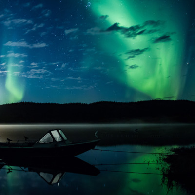 Northern lights over Quartz Lake on a misty moonlit night.