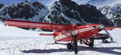 Posing in front of small plane after glacier landing flight out of Talkeetna, Alaska.