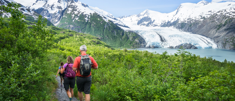 Hikers near the glacier in Portage Pass.