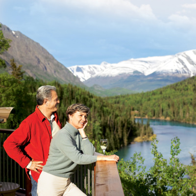 Guests enjoying view from Kenai Princess Lodge deck.