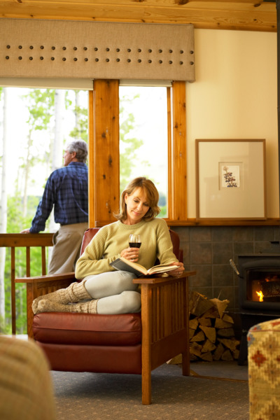 Guest room with warm fireplace and deck.