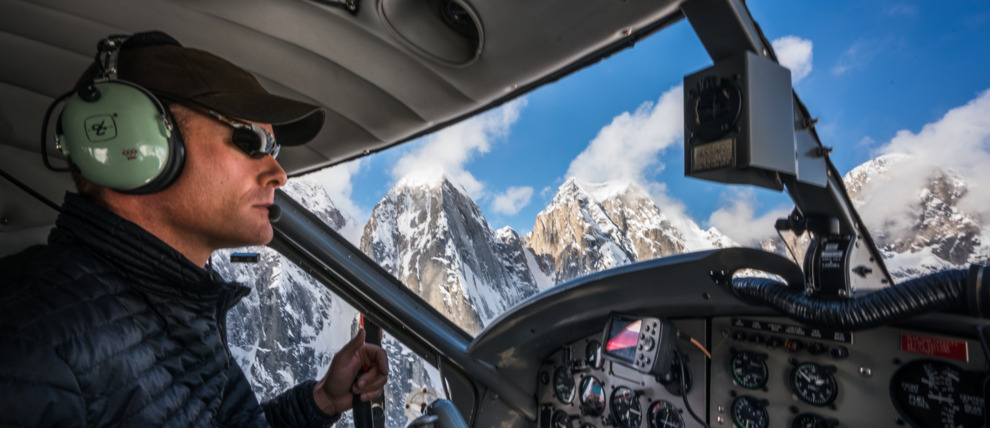 Pilot navigating the K2 Aviation Denali Experience flight.