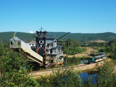 Guests take a train ride to reach Gold Dredge 8.