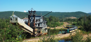 Guests take a train ride to reach Gold Dredge 8.