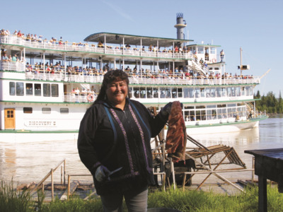 Enjoy a Alaskan salmon smoking demonstration from the Riverboat Discovery.