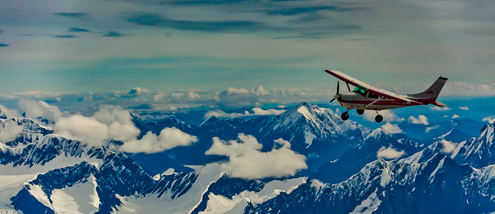 Fly above the clouds in Denali National Park. Fly above the clouds in Denali National Park.