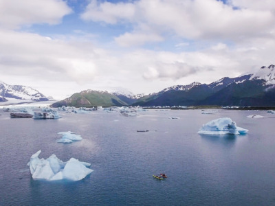 Kayak among icebergs near Bear Glacier. Kayak among icebergs near Bear Glacier.
