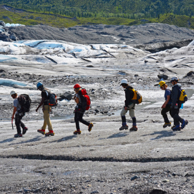 Guests practice walking on ice with an experienced guide.
