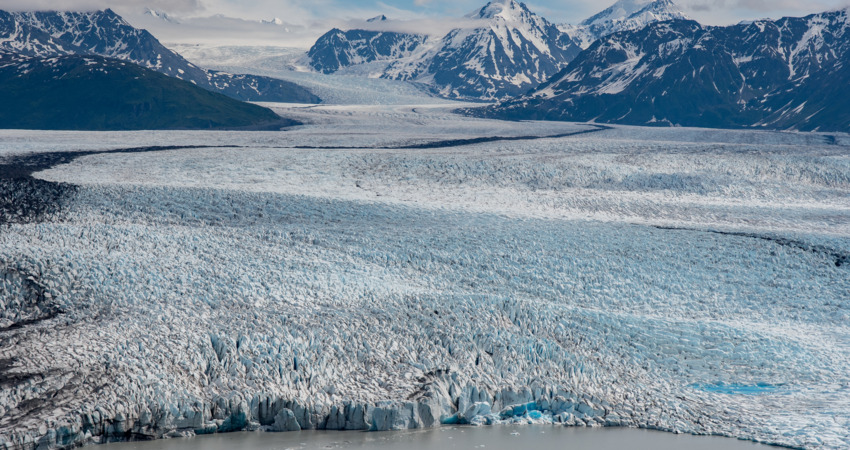 Take in spectacular views of Knik glacier from the air.