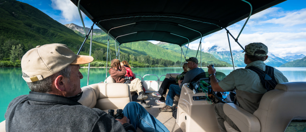 Guests bear watching from a boat on Lake Clark. Guests bear watching from a boat on Lake Clark.