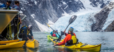 Reboarding the boat after an exploration of Northwestern Fjord.