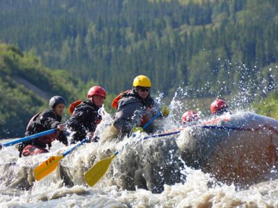 Splash through Class III and IV Nenana River rapids on an exhilarating whitewater raft trip.