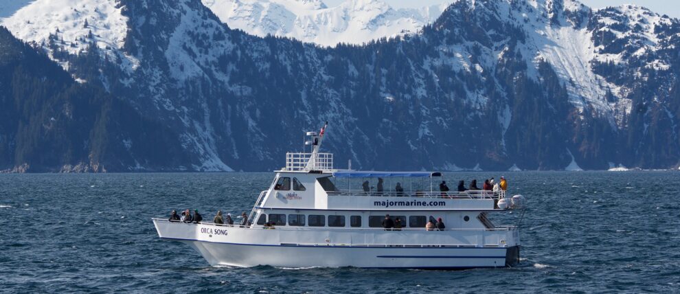 Coastal mountain make a dramatic backdrop for Seward-based Orca Song.