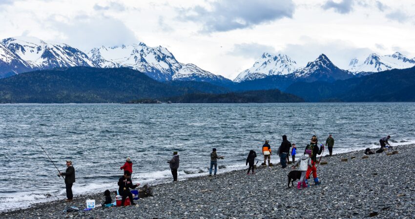 Families fishing off the Homer Spit.