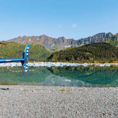 Tail of a helicopter on a lagoon landing.