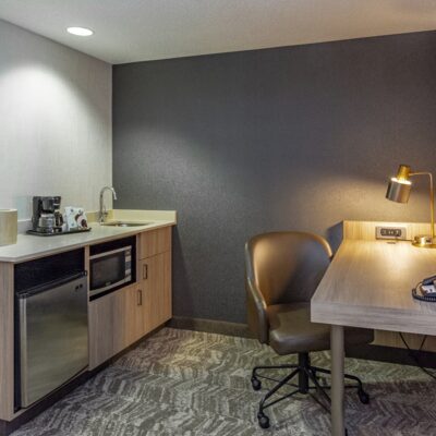 Desk and mini kitchen in a suite at the Springhill Anchorage. Desk and mini kitchen in a suite at the Springhill Anchorage.