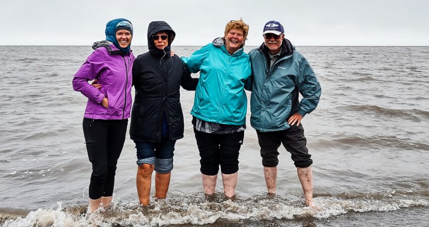 Dipping our toes in the Arctic Ocean.