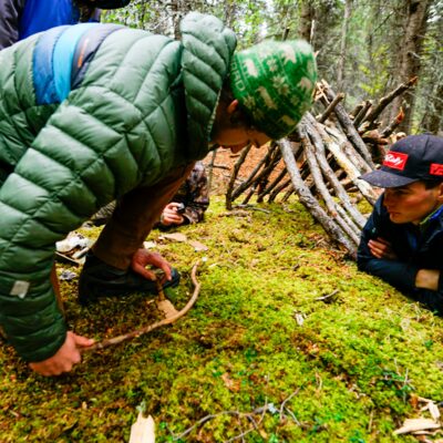 Fire making demo on the Denali Survivalist Hike.